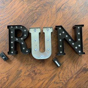 RUN Letter Sign